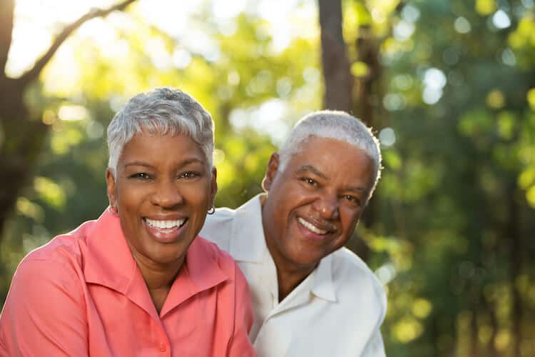 A senior couple happy and enjoying the benefits of their senior living community.