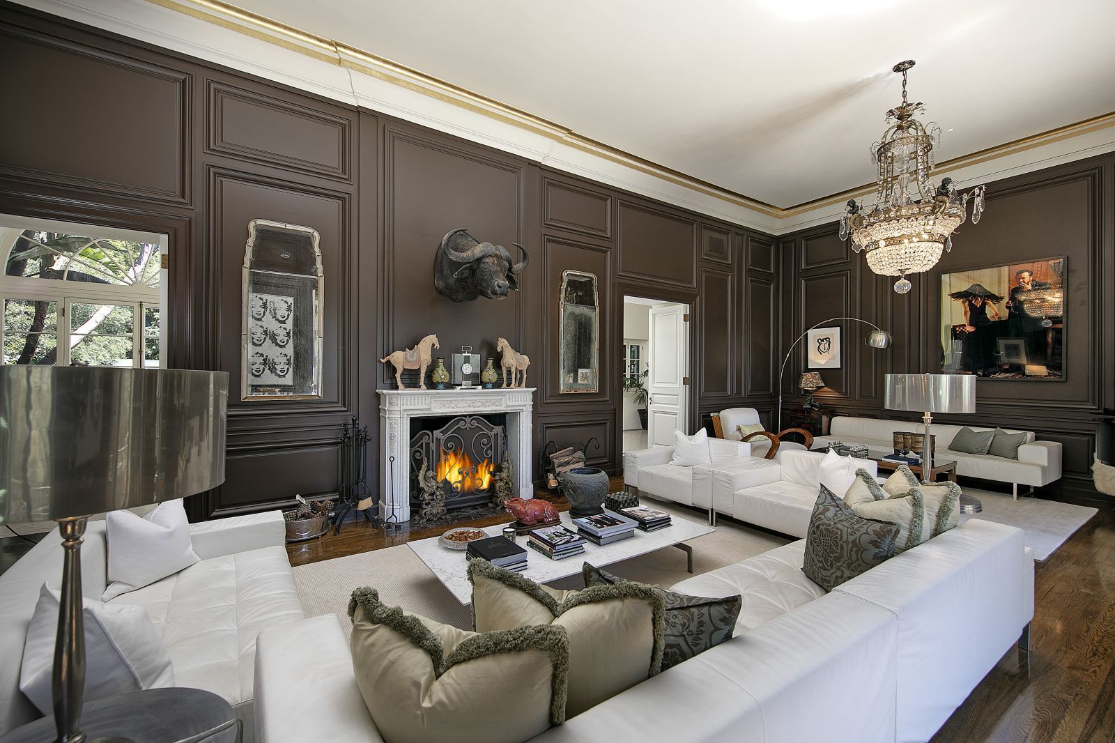 The wood paneled living room of a historic, luxury estate in Montecito.