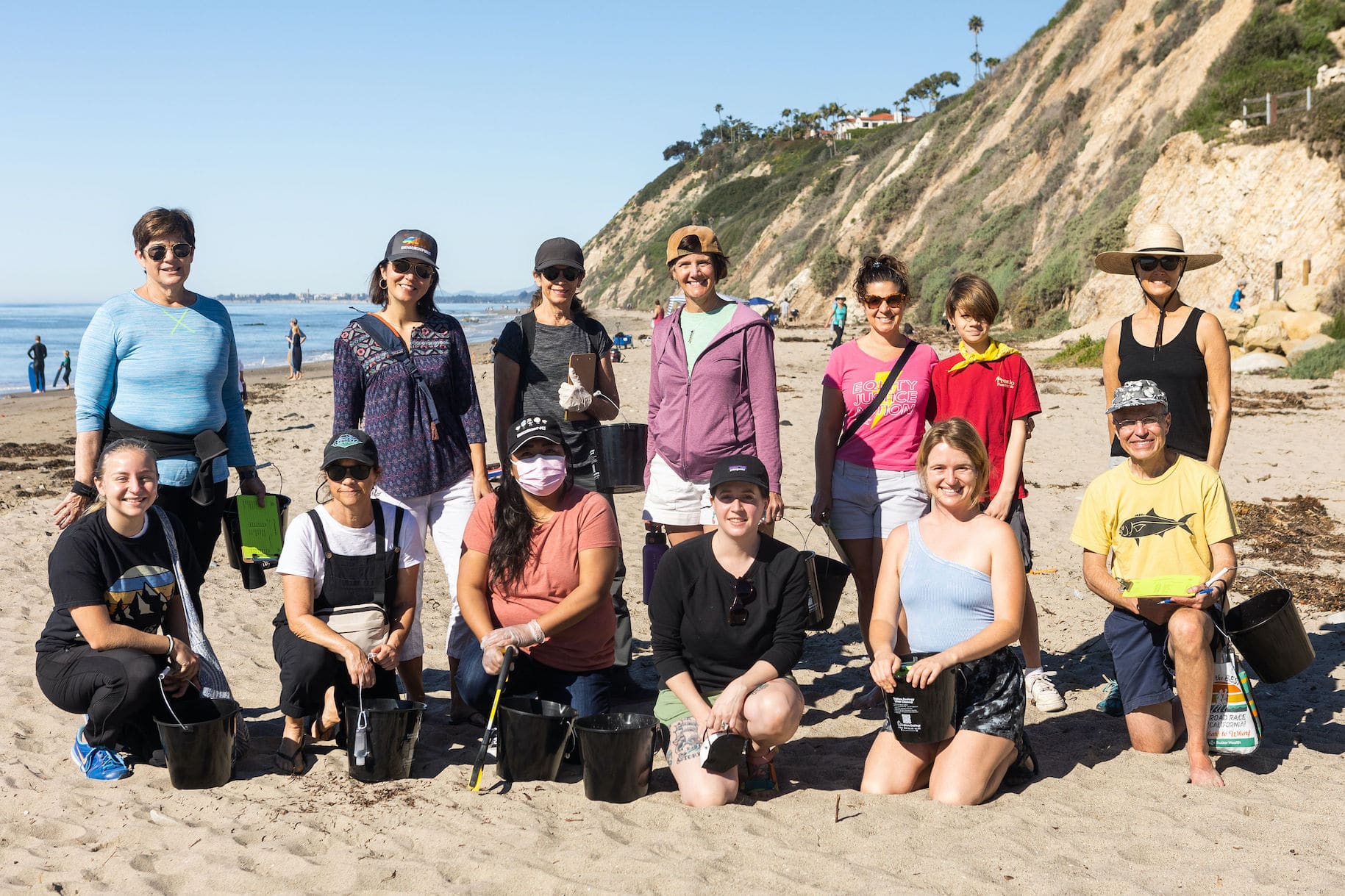 Group of young environmentalists at the beach