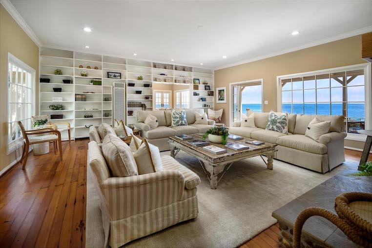 This living room features a light buttery yellow as a neutral base color.