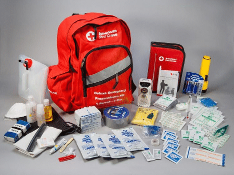 An official Red Cross Disaster Preparedness Kit with all the items needed surrounding it