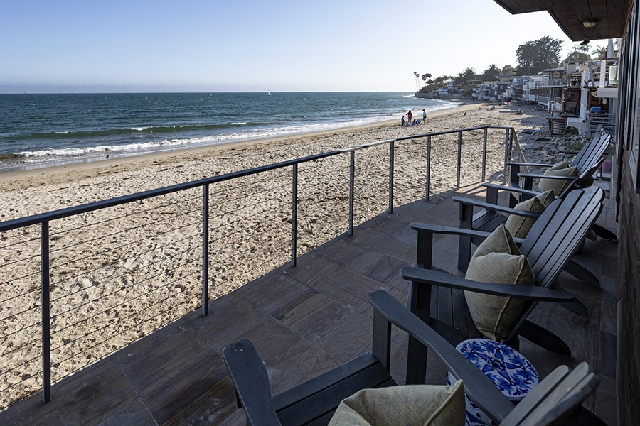 The backyard of this Miramar Beach House is the pristine white sand.