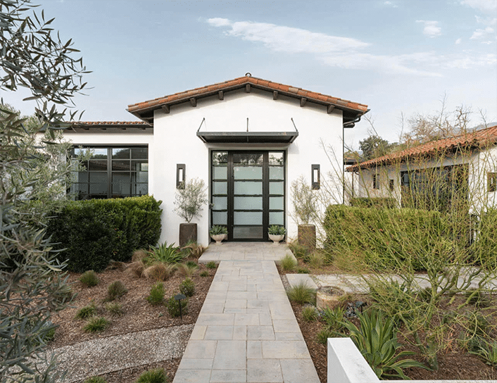 Entry to the main residence at a Mediterranean style Ennisbrook estate