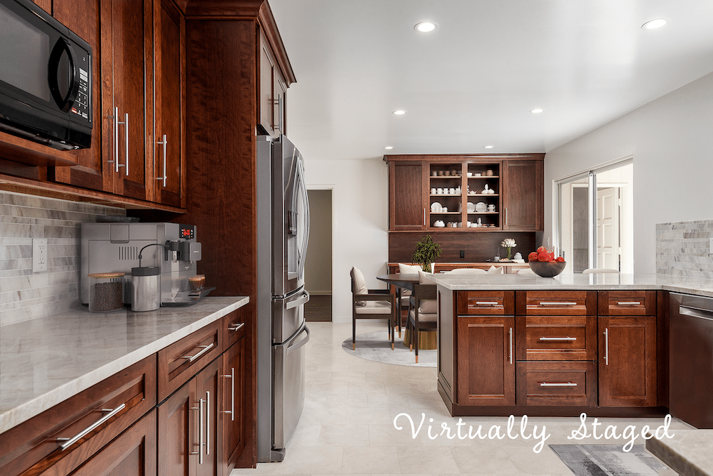 Lovely, clean Hope Ranch kitchen decorated with the interior design trends of 2022 that's currently on the market.