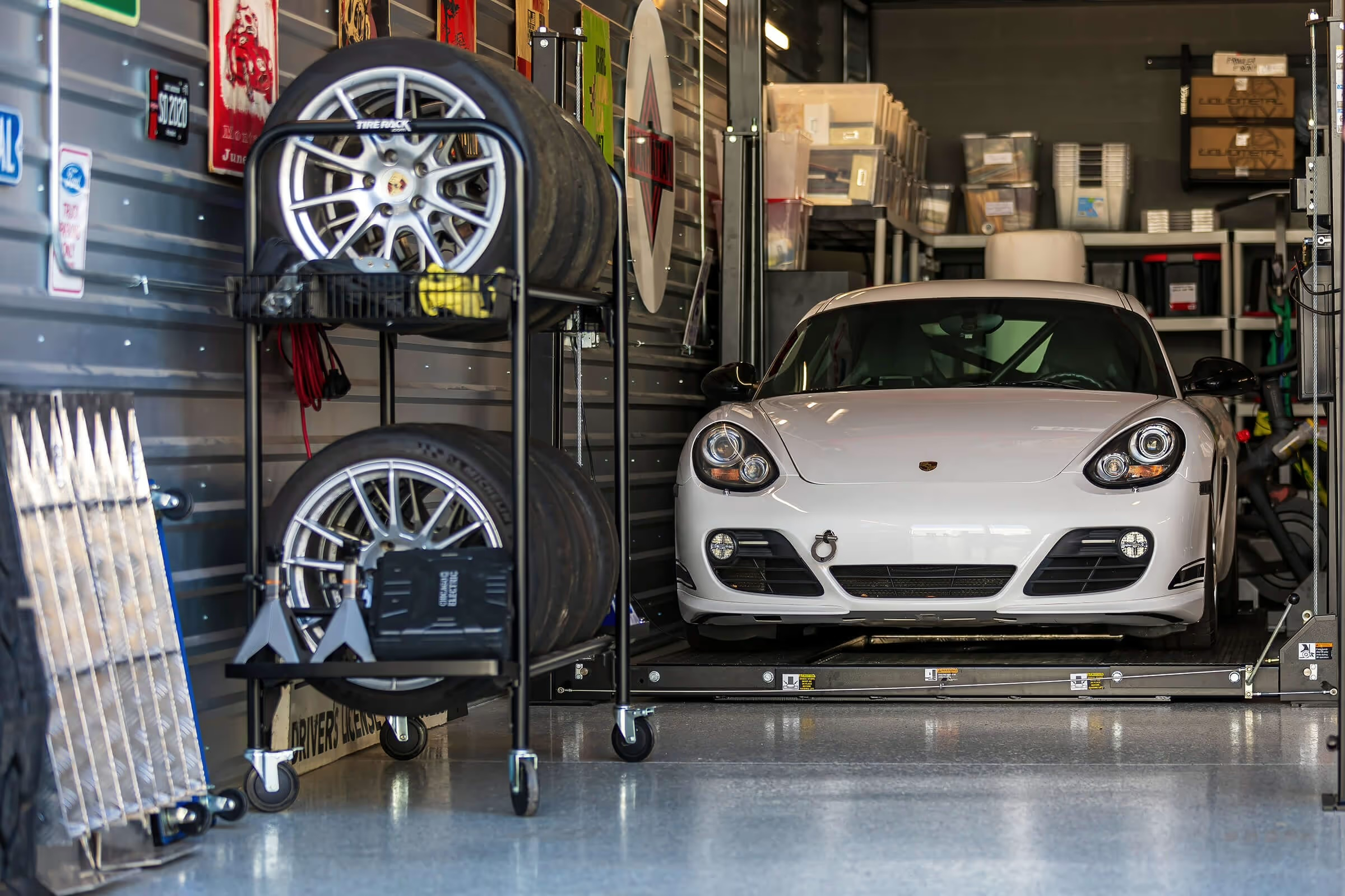 A car and car parts inside a storage facility