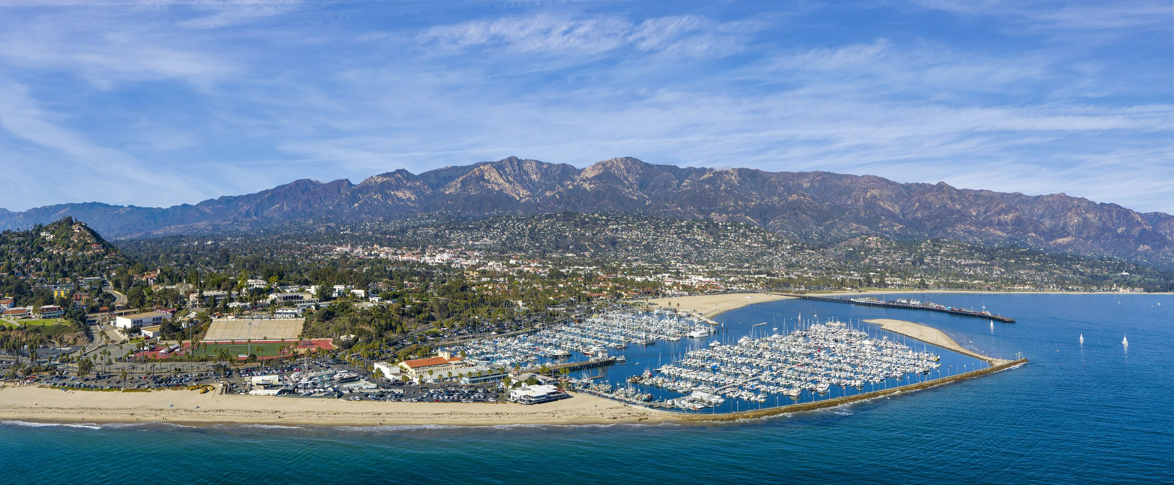 A birds eye view of Santa Barbara looking from the harbor to Montecito and the mountains.