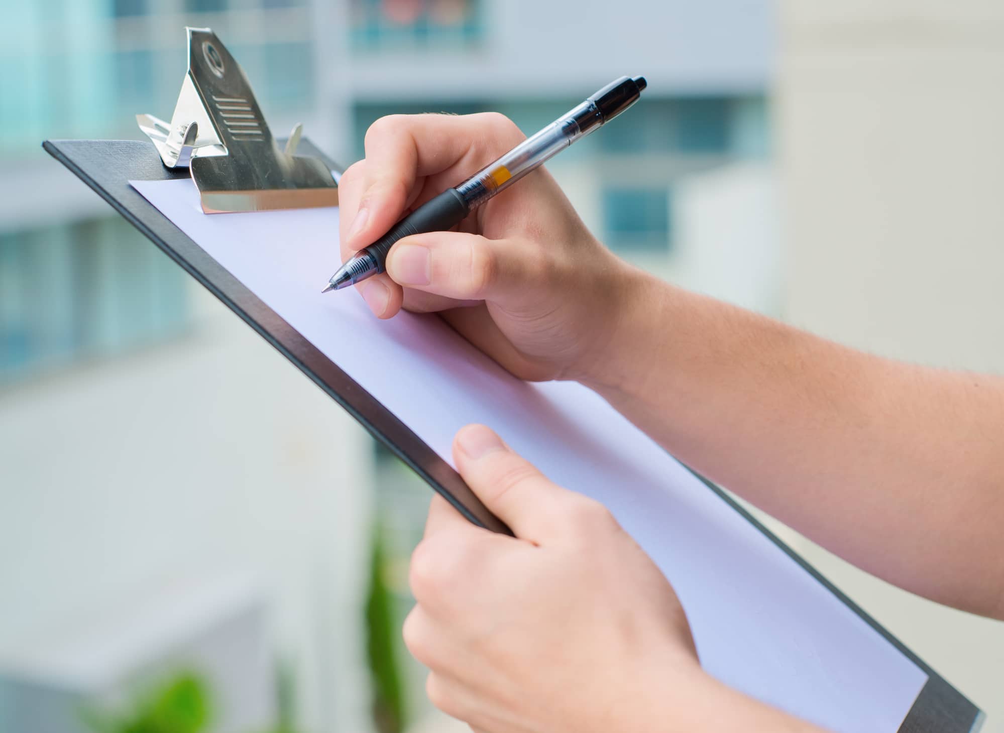 Home Inspector Holding A Clipboard And Writing, Out Door