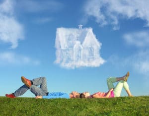 lying couple on grass and heathy house collage