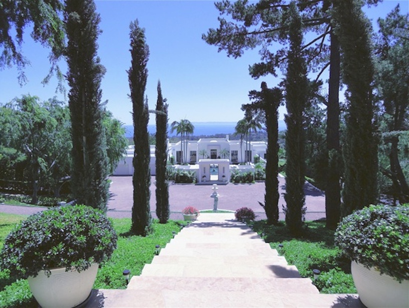 One of several Montecito estates listed by Cristal Clarke. White Neo-classical-Modernist home overlooking the Pacific Ocean