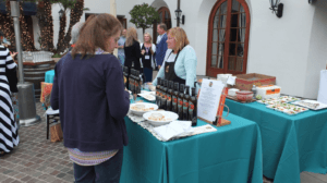 customer in front f table for complimentary olive oil tasting in rancho oilivos