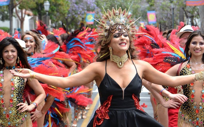 Beautiufl woman leading others at the summer solstice parade