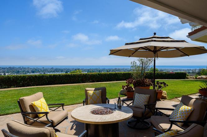 Backyard dining at a charming oceanview home that's currently on the market