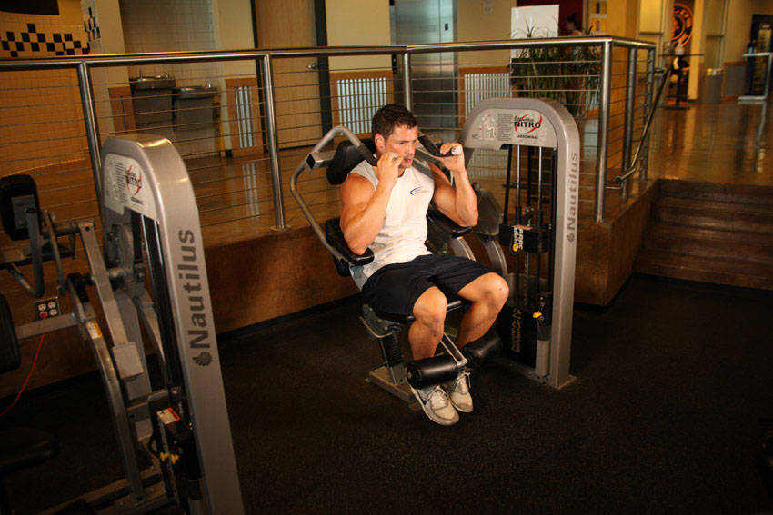 Ab Crunch Machine — end position, working the abs