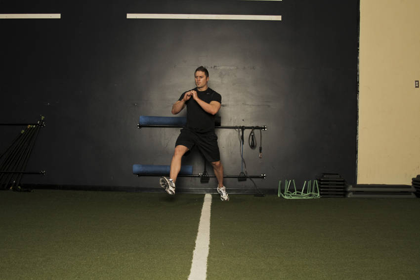 Alternate Leg Diagonal Bound — starting position, working the quads