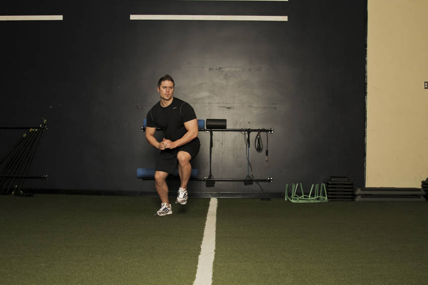 Alternate Leg Diagonal Bound — end position, working the quads