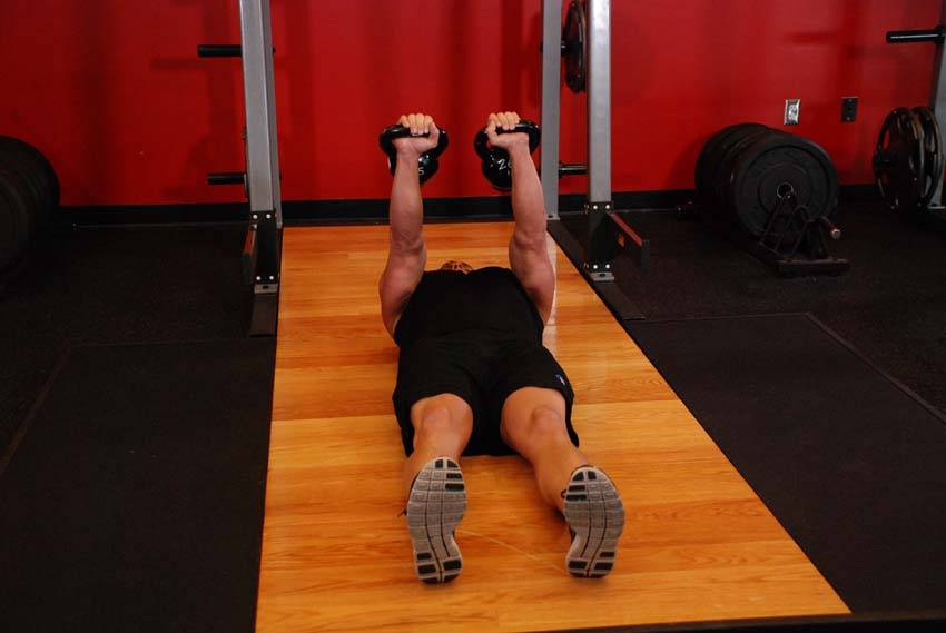 Alternating Floor Press — starting position, working the chest