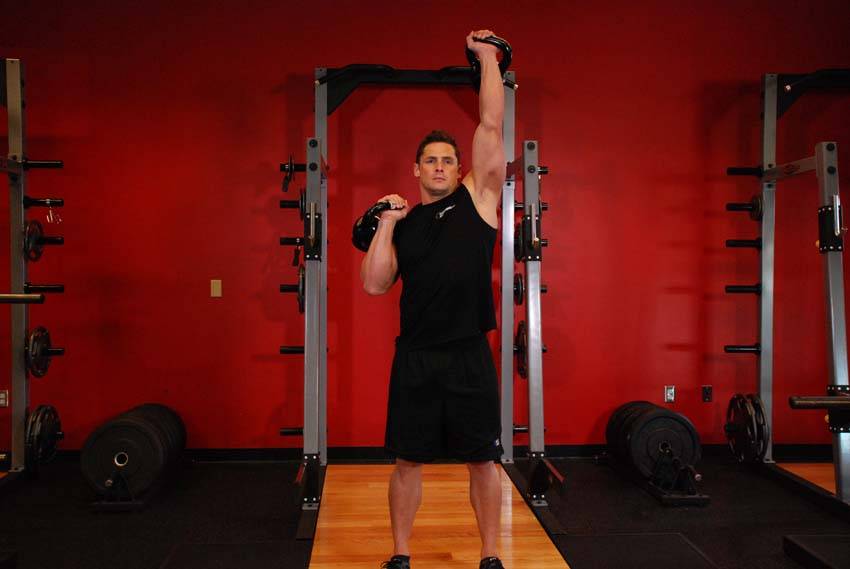 Alternating Kettlebell Press — end position, working the shoulders