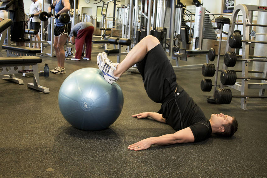 Ball Leg Curl — end position, working the hamstrings