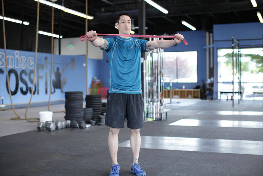 Band Pull Apart — starting position, working the shoulders