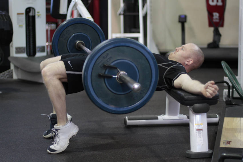 Barbell Hip Thrust — end position, working the glutes