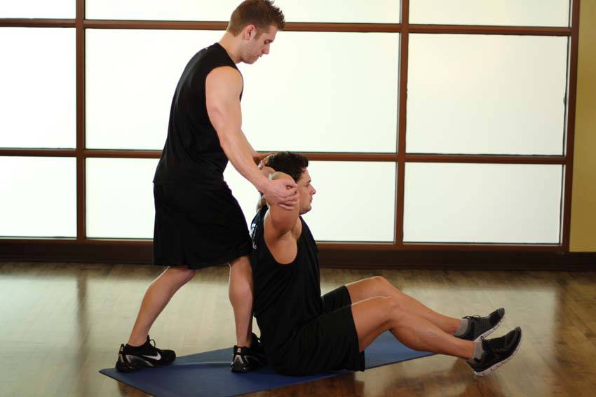 Behind Head Chest Stretch — starting position, working the chest