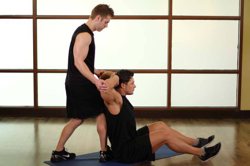Behind Head Chest Stretch — end position, working the chest