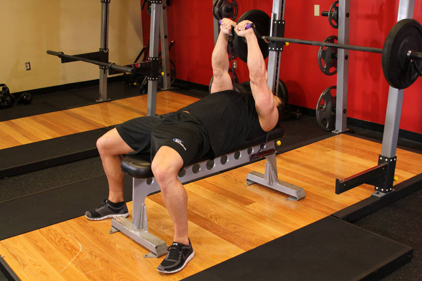 Bench Press - With Bands — end position, working the chest