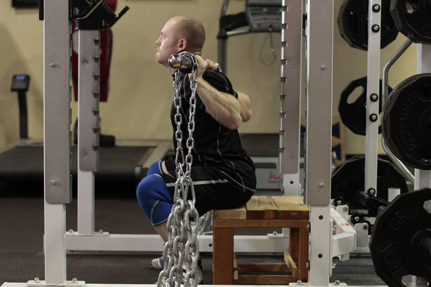 Box Squat with Chains — end position, working the quads