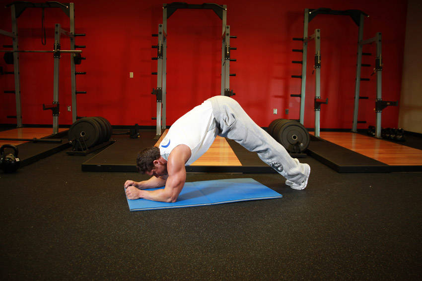 Butt-Ups — end position, working the abs