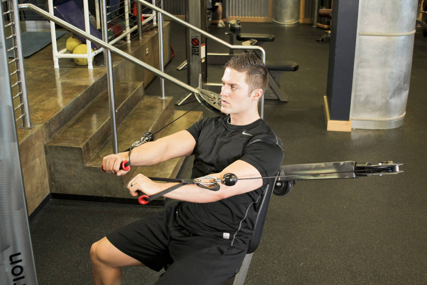 Cable Chest Press — end position, working the chest
