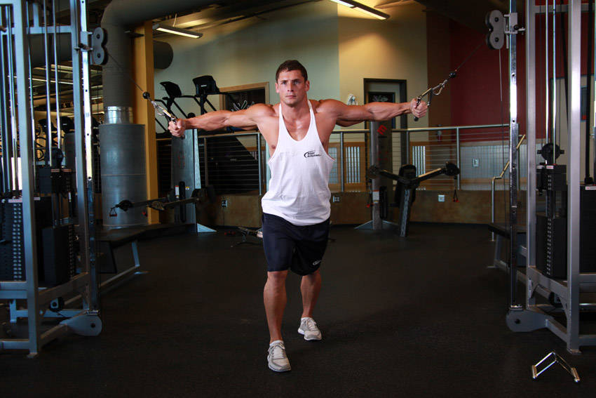 Cable Crossover — starting position, working the chest