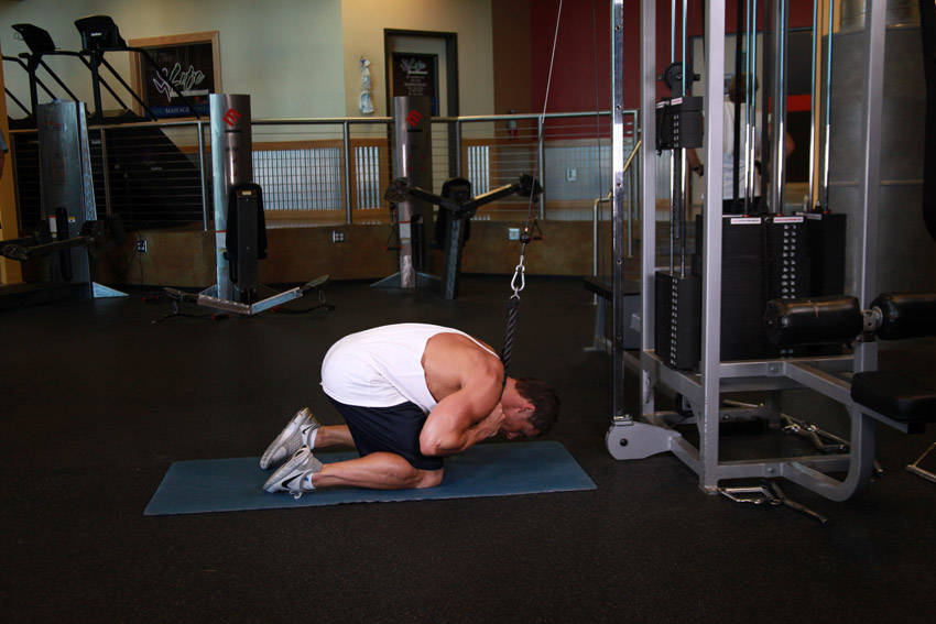 Cable Crunch — end position, working the abs