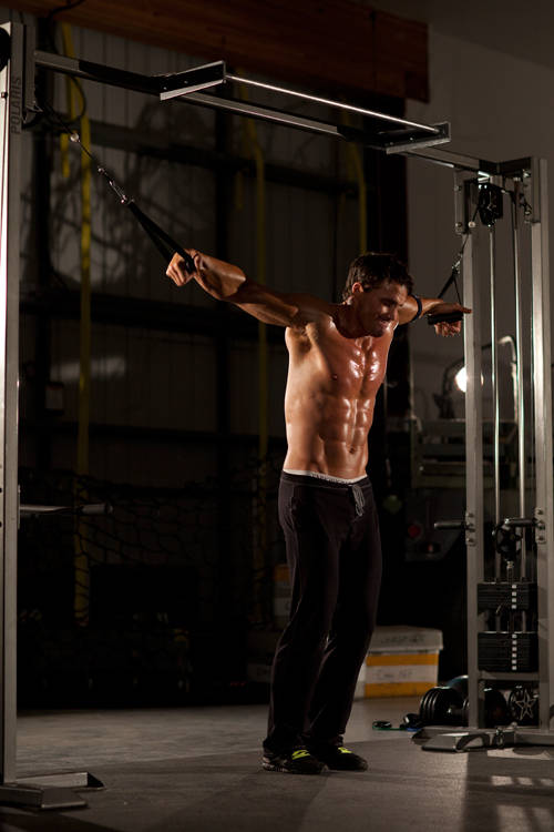 Cable Iron Cross — starting position, working the chest