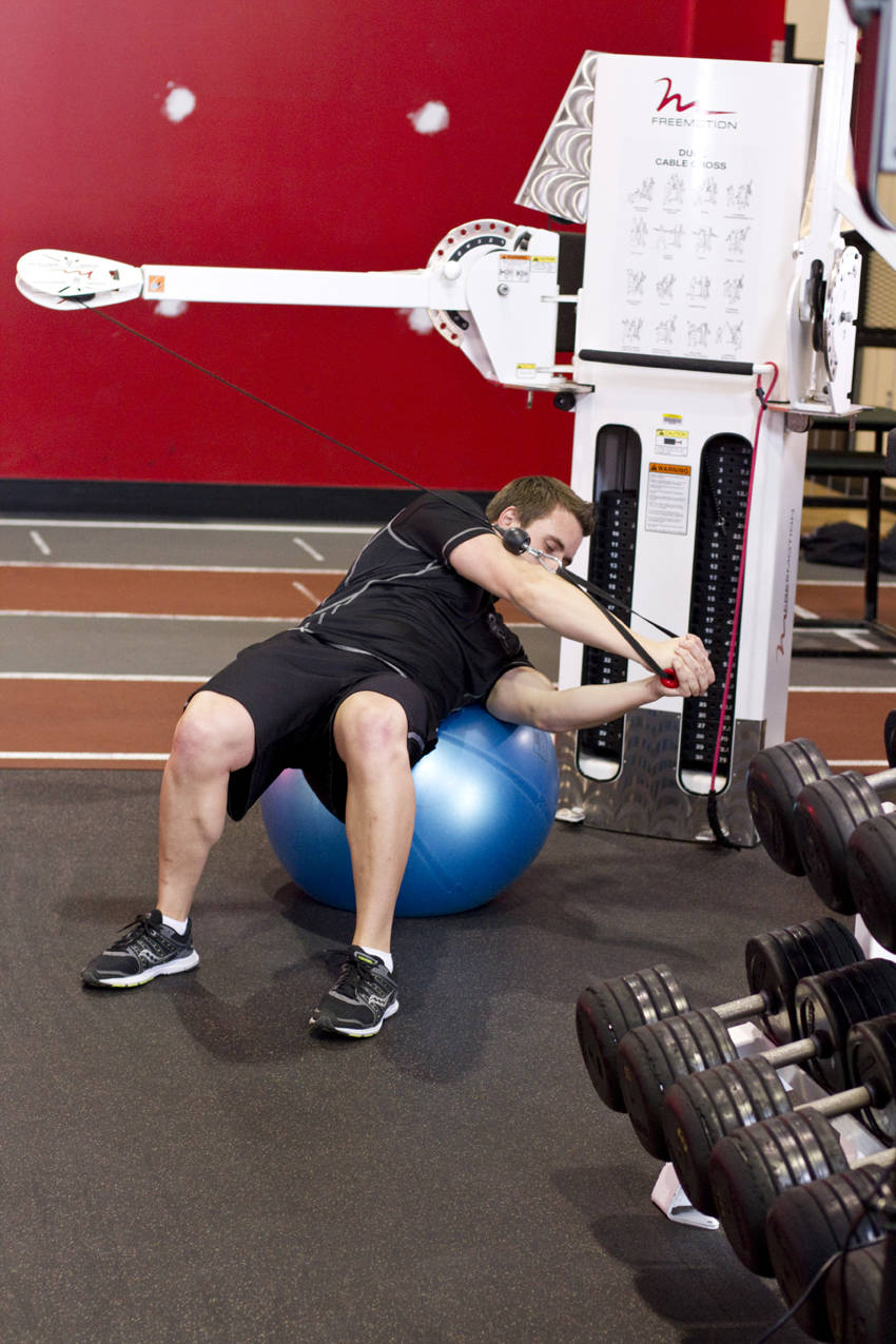 Cable Russian Twists — end position, working the abs