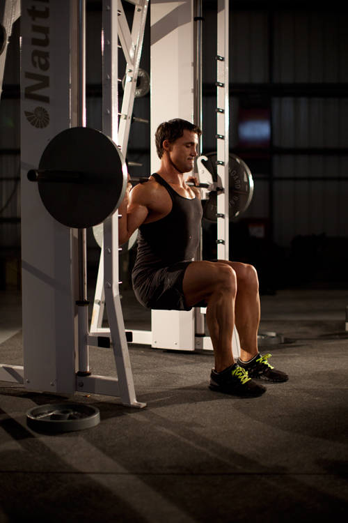 Chair Squat — end position, working the quads