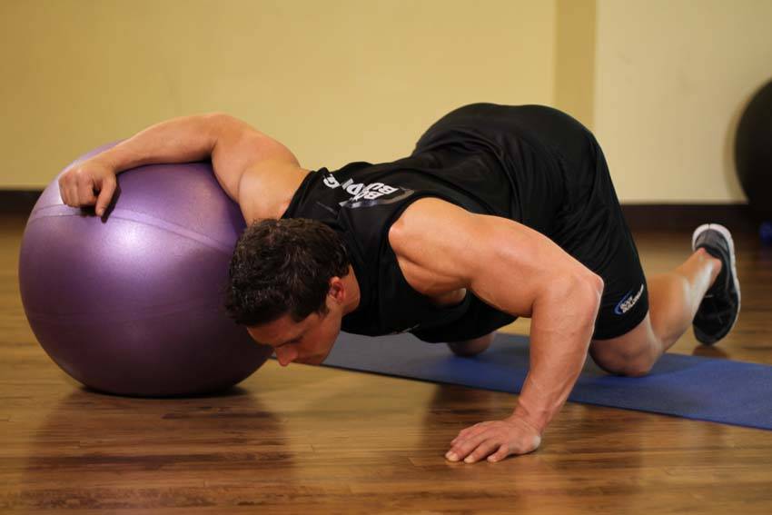 Chest Stretch on Stability Ball — starting position, working the chest