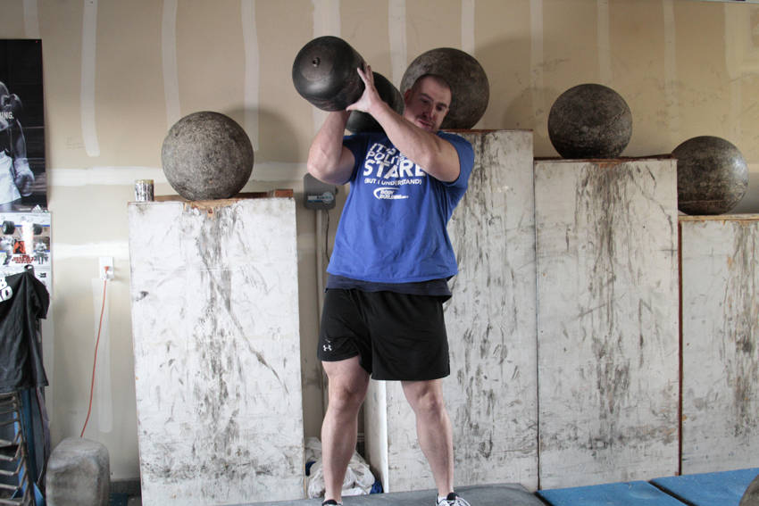 Circus Bell — end position, working the shoulders