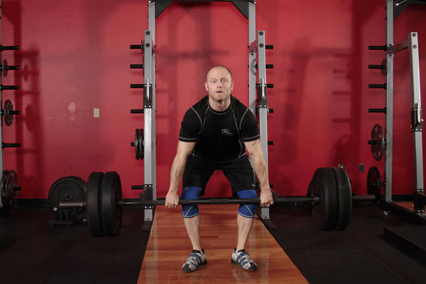 Clean Deadlift — end position, working the hamstrings