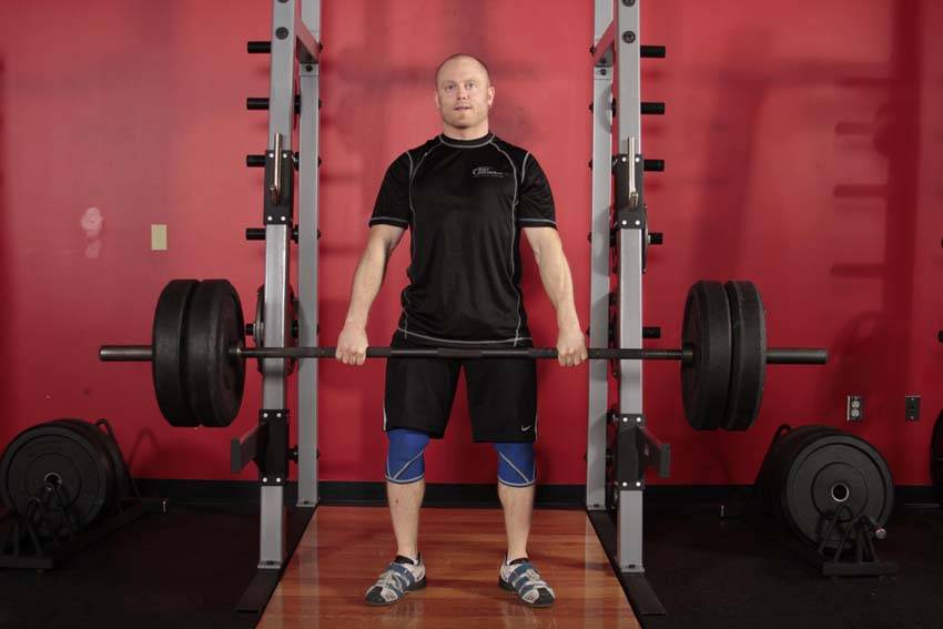 Clean Shrug — starting position, working the traps