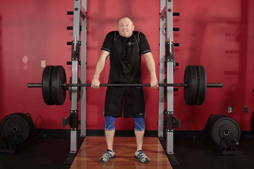 Clean Shrug — end position, working the traps