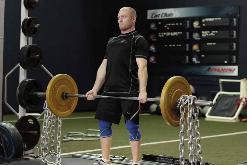 Deadlift with Chains — end position, working the lower back
