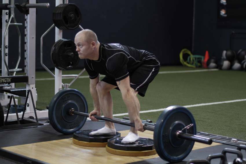 Deficit Deadlift — starting position, working the lower back