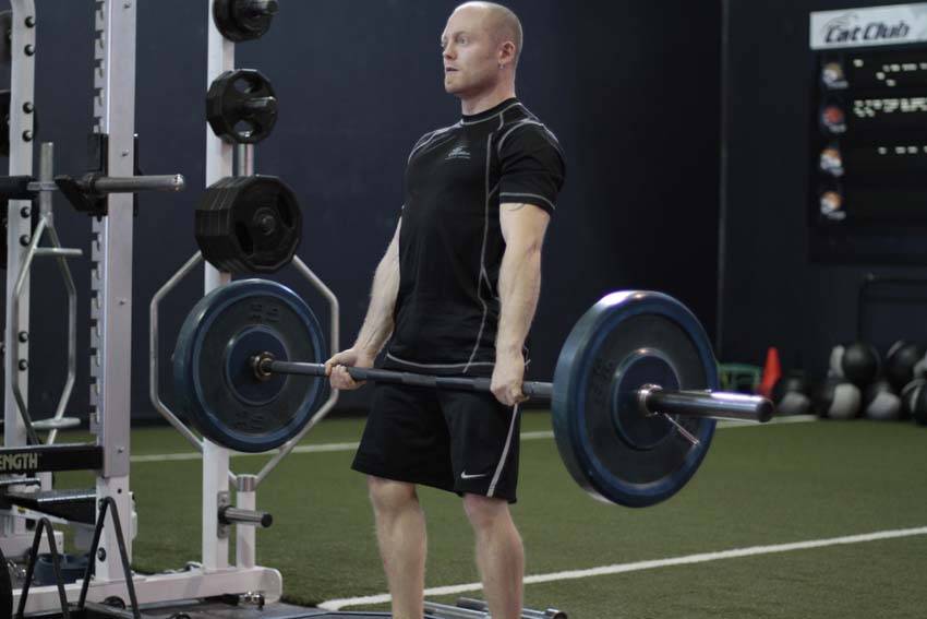 Deficit Deadlift — end position, working the lower back