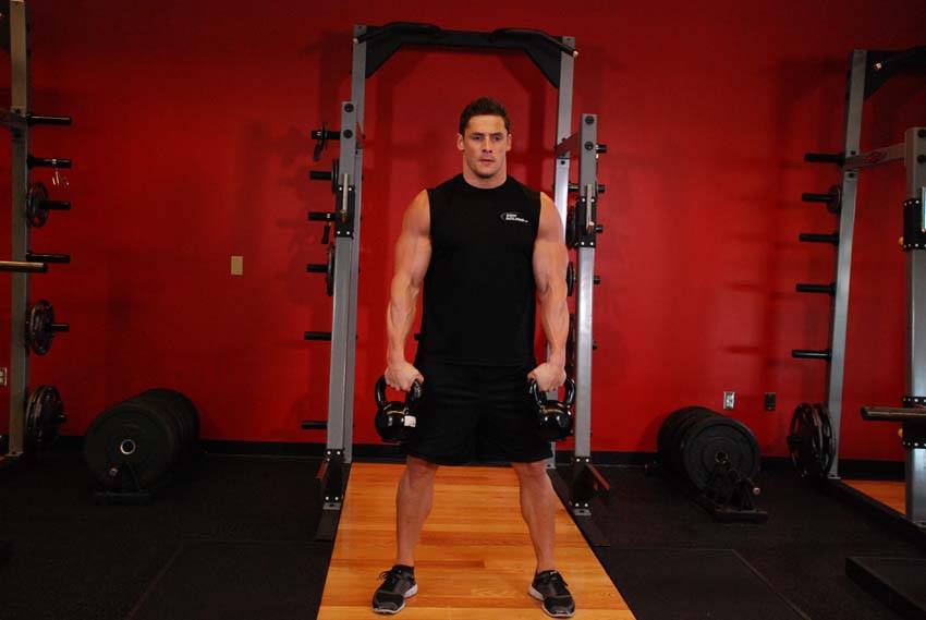 Double Kettlebell Snatch — starting position, working the shoulders