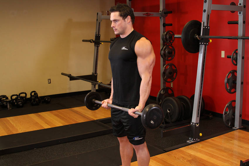 Drag Curl — starting position, working the biceps