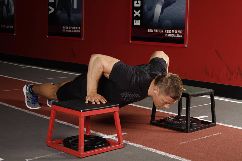 Drop Push — end position, working the chest