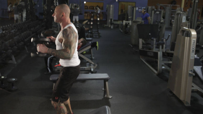 Dumbbell Clean — end position, working the hamstrings