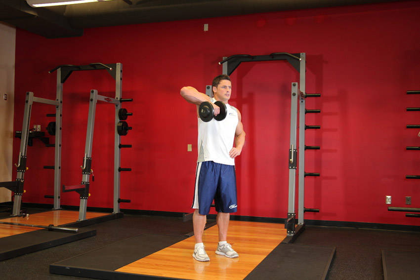 Dumbbell One-Arm Upright Row — starting position, working the shoulders