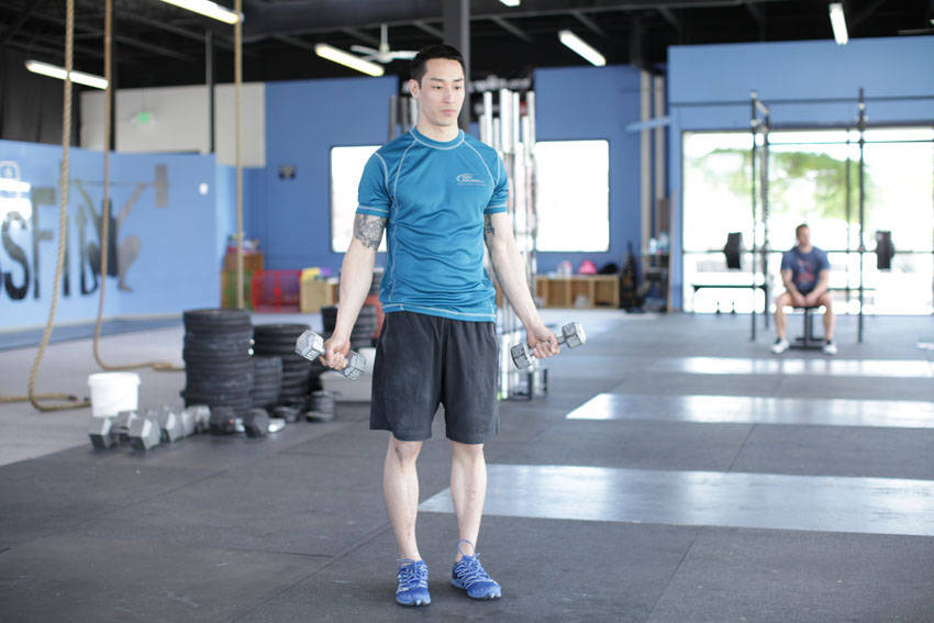 Dumbbell Scaption — starting position, working the shoulders