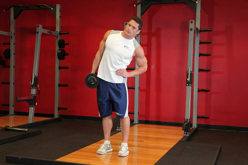 Dumbbell Side Bend — end position, working the abs